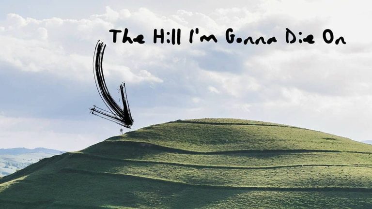 Bright green hill with arrow pointing to Jesus and uplifting worship message.