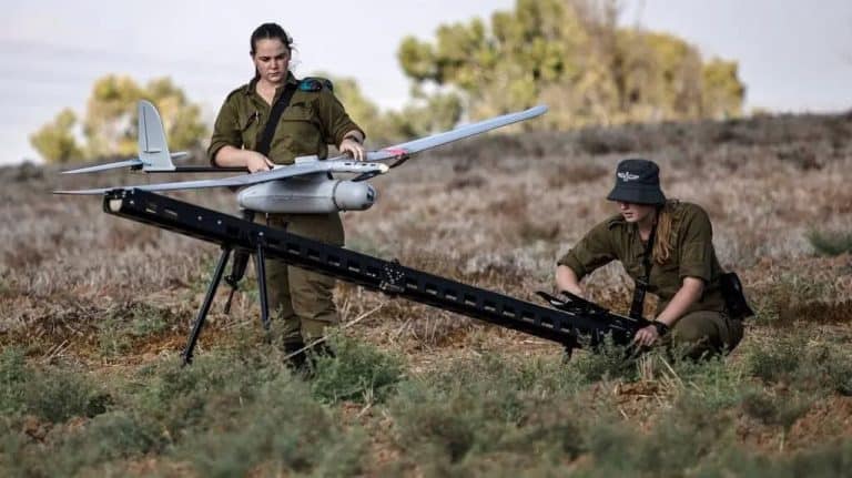 Drone military testing in open field for national security exploration.